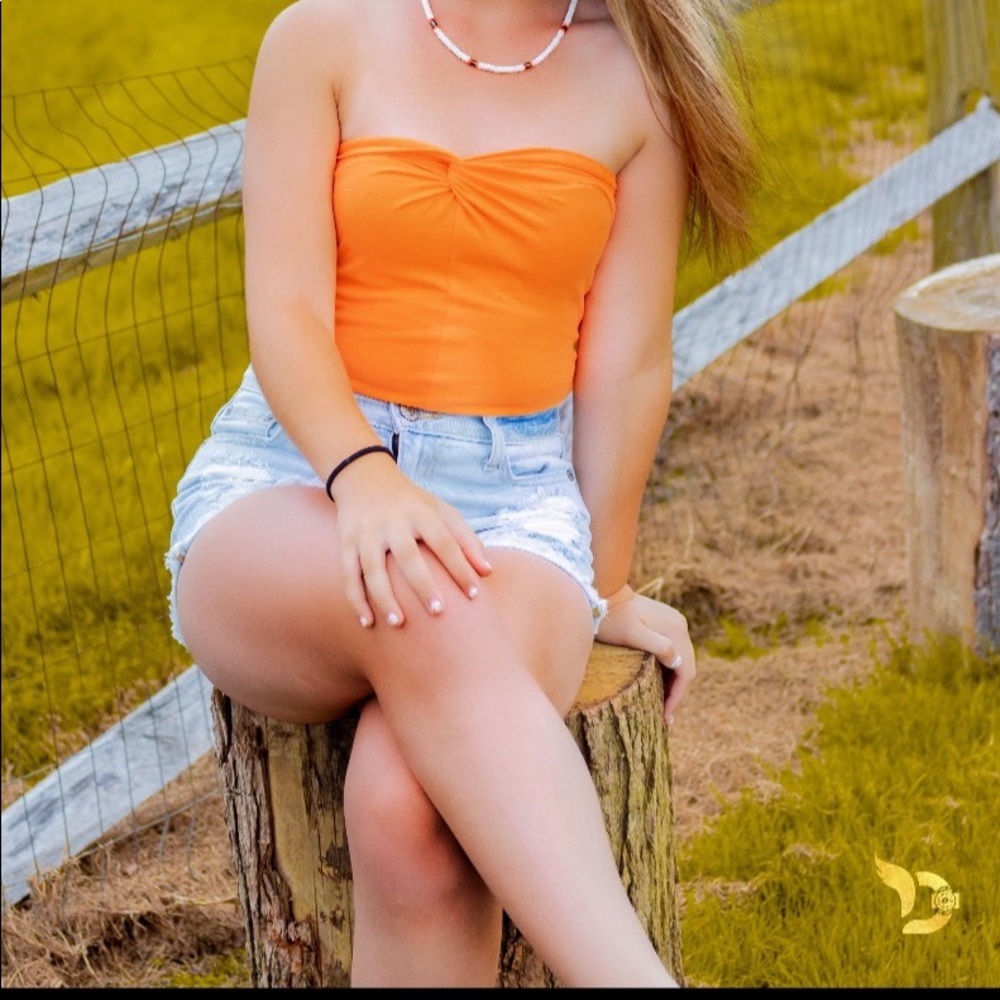 Orange bodysuit